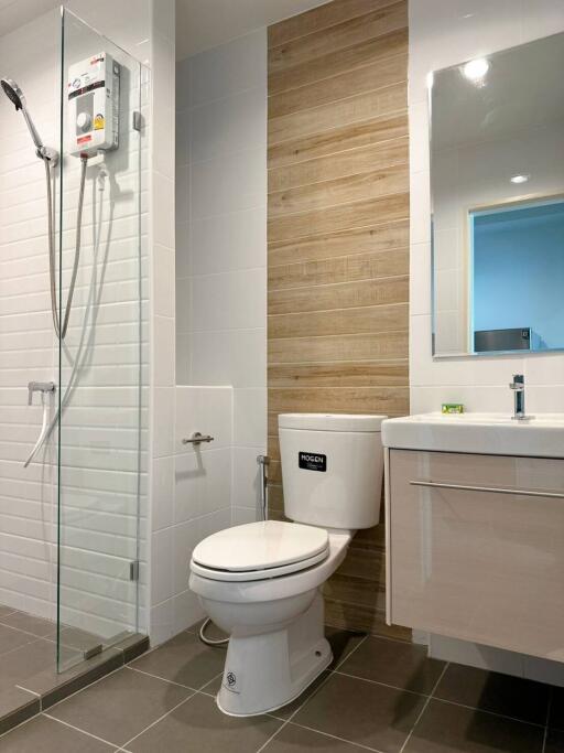 Modern bathroom with wooden accents and white fixtures