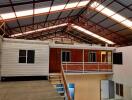 Modular home inside spacious industrial warehouse