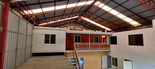 Modular home inside spacious industrial warehouse