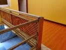 Spacious hallway with vibrant yellow walls and wooden features