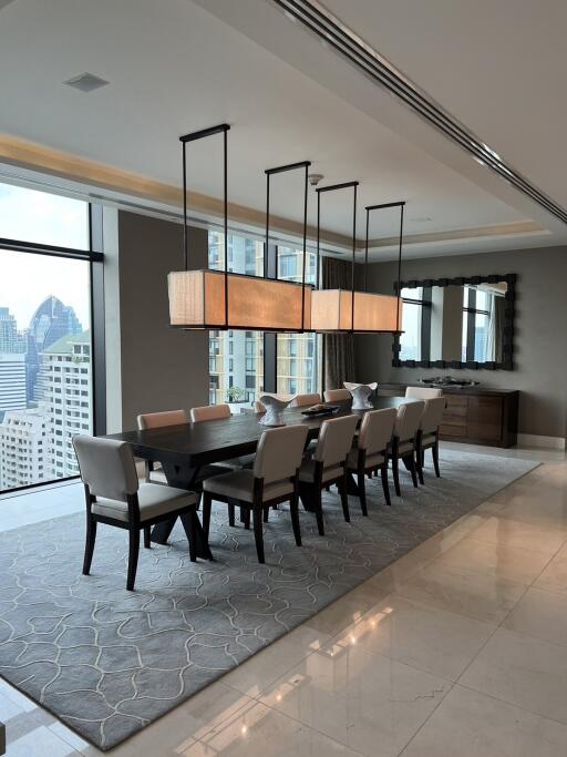 Elegant dining room with modern furnishings and city view