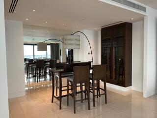 Modern dining area with open plan adjacent to kitchen