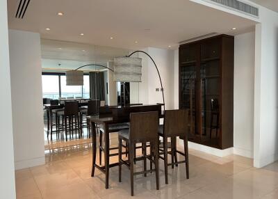 Modern dining area with open plan adjacent to kitchen