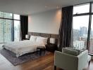 Spacious modern bedroom with city view