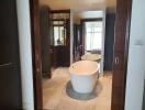 Modern bathroom with freestanding tub and elegant marble flooring