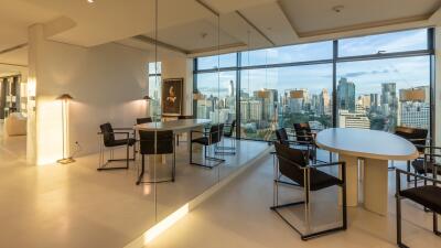 Spacious modern living room with cityscape views