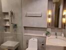Modern bathroom with elegant fixtures and warm lighting