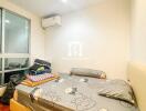 Comfortable bedroom with bright lighting and modern amenities