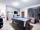 Spacious living room with pool table and modern amenities