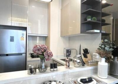 Modern kitchen with stainless steel appliances and sleek cabinetry