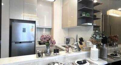 Modern kitchen with stainless steel appliances and sleek cabinetry