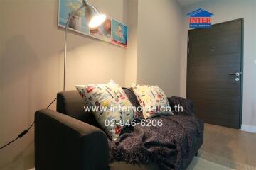 Cozy living room with comfortable sofa and modern decor