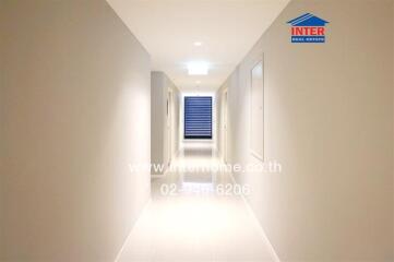 Brightly lit modern hallway in a residential building