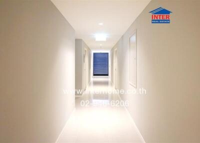 Brightly lit modern hallway in a residential building