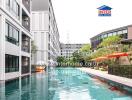 Luxurious pool with modern buildings in the background