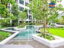Lush communal garden with swimming pool in modern residential building