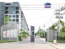 Modern residential building entrance with security gate