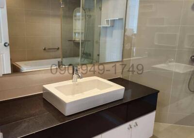 Modern bathroom with glass shower and stylish vanity