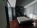 Modern bedroom with large bed and stylish design