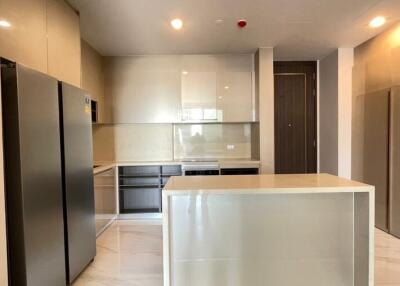 Modern kitchen with stainless steel appliances and ample cabinetry