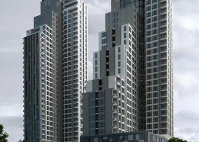 Modern high-rise residential towers against a cloudy sky