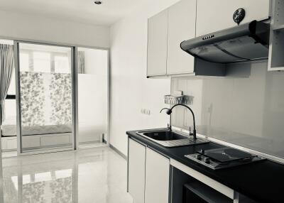 Modern kitchen with sleek design and natural light