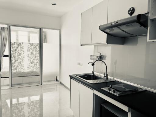 Modern kitchen with sleek design and natural light