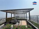Elegant rooftop garden with pergola and city view