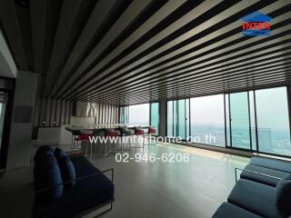 Spacious modern living room with panoramic city views