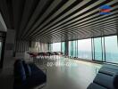 Spacious modern living room with panoramic city views