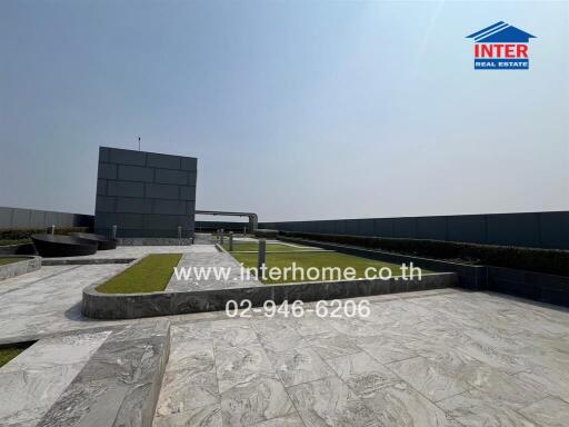 Luxurious rooftop terrace with elegant marble flooring and modern design