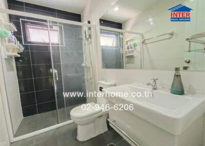 Modern bathroom with shower stall and glass door