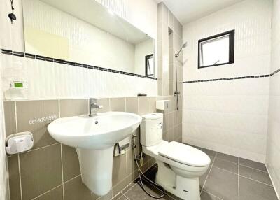 Clean and modern bathroom with white sanitary ware