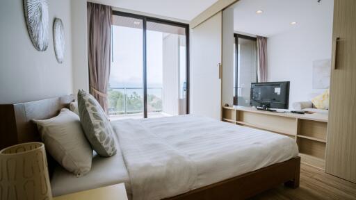 Spacious bedroom with scenic view and modern amenities