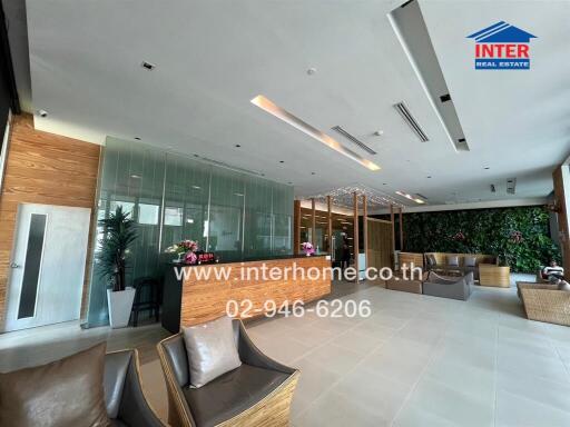 Spacious and modern lobby with comfortable seating and elegant decor