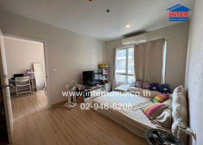 Spacious living room with natural light and modern amenities