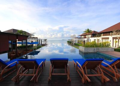 Luxurious resort-style outdoor pool overlooking the ocean