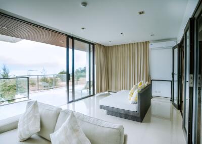 Spacious and bright living room with panoramic views and modern furniture