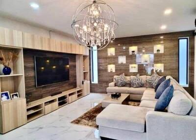 Modern spacious living room with elegant furnishings and stylish decor