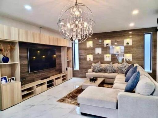 Modern spacious living room with elegant furnishings and stylish decor