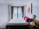 Modern bedroom with ocean view and minimalist decor