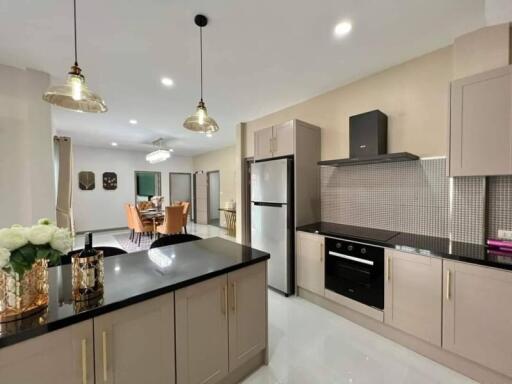 Modern kitchen with integrated dining area