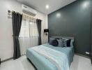 Modern bedroom with stylish decor and air conditioning