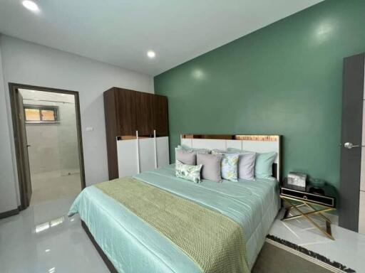 Modern bedroom with stylish decor and en-suite bathroom
