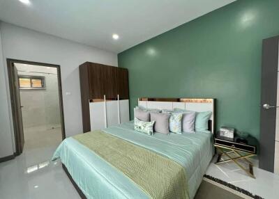 Modern bedroom with stylish decor and en-suite bathroom