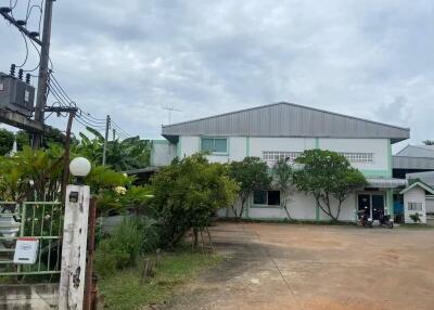 Spacious two-story residential building with large front yard