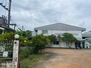 Spacious two-story residential building with large front yard