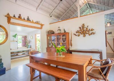 Spacious and well-decorated living room with wooden furnishings