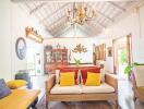 Bright and spacious tropical style living room with high vaulted ceiling