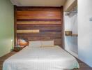 Cozy bedroom with multi-toned wooden wall and minimalist decor